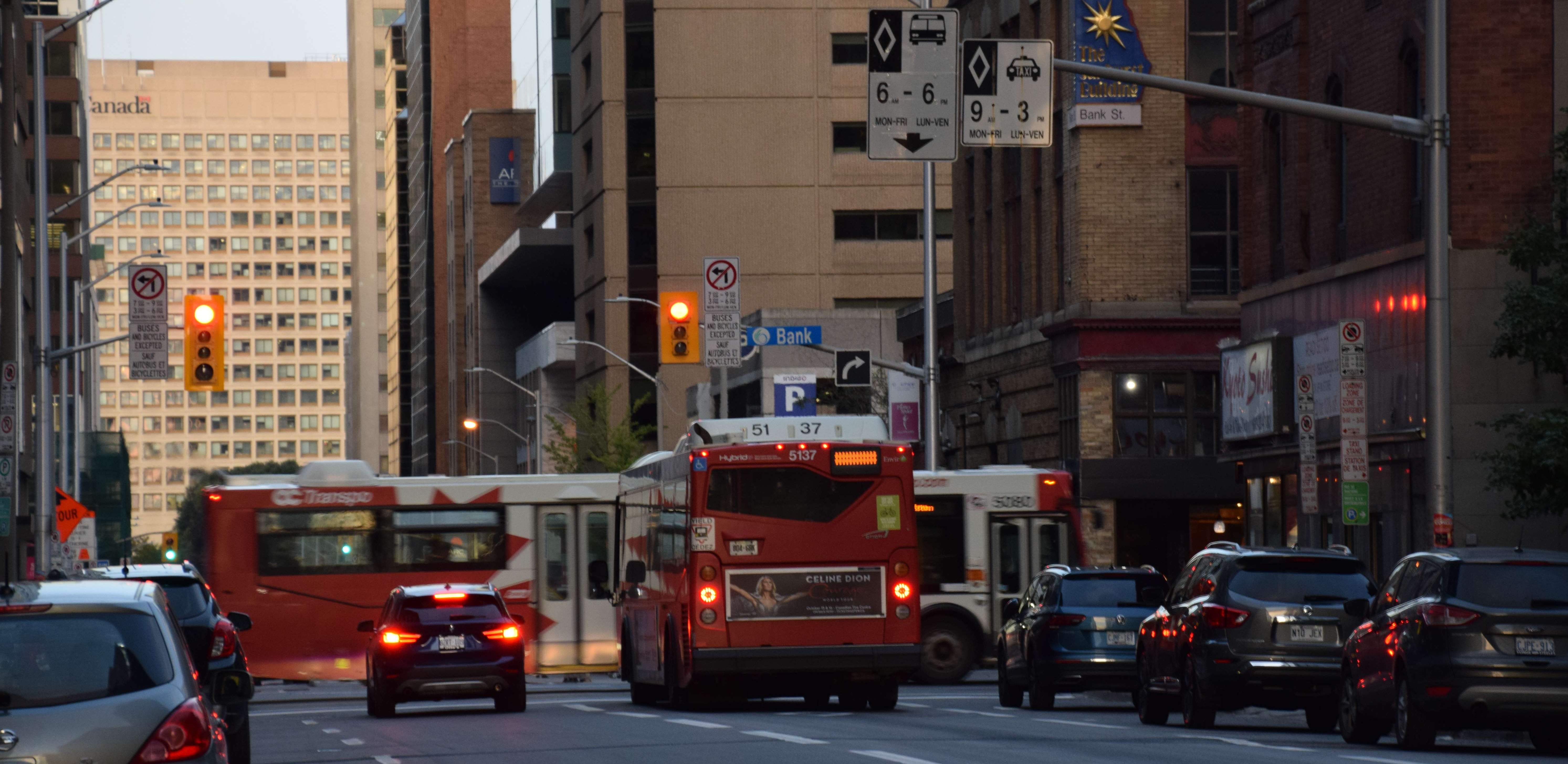 Buses in a bus lane turning onto Bank Street